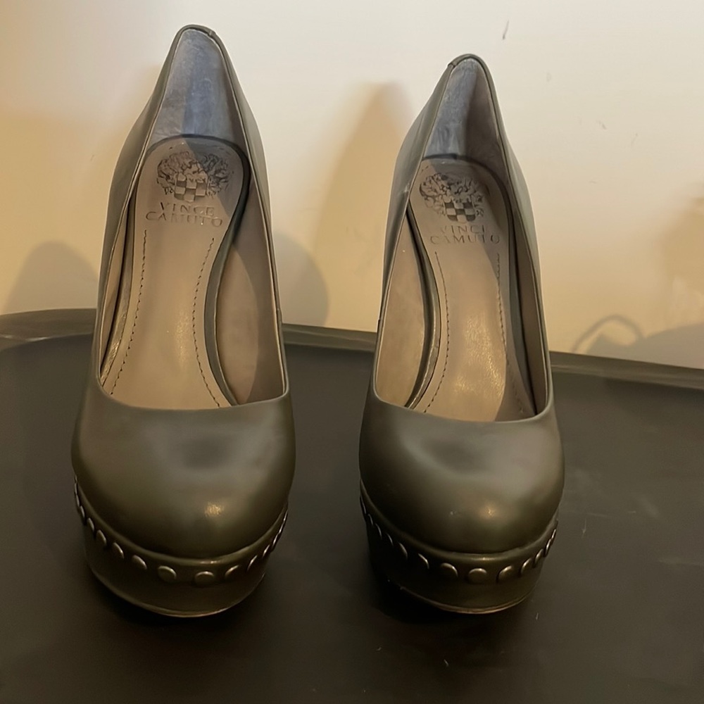 Women’s high heels in dark gray with gray studs on the heel and foot bed